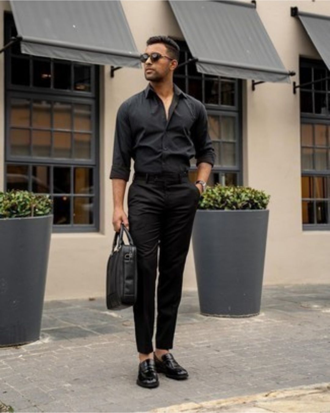 black shirt and black pant combination