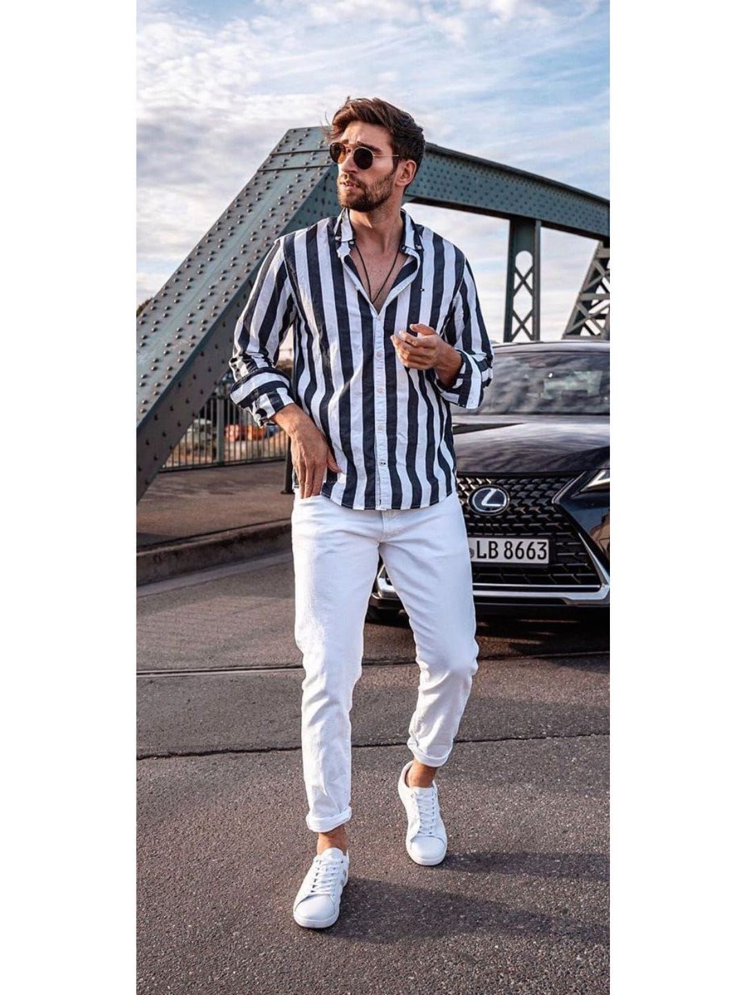 Read more about the article Black & White Striped Long Sleeve Shirt With White Jeans Outfits For Men
