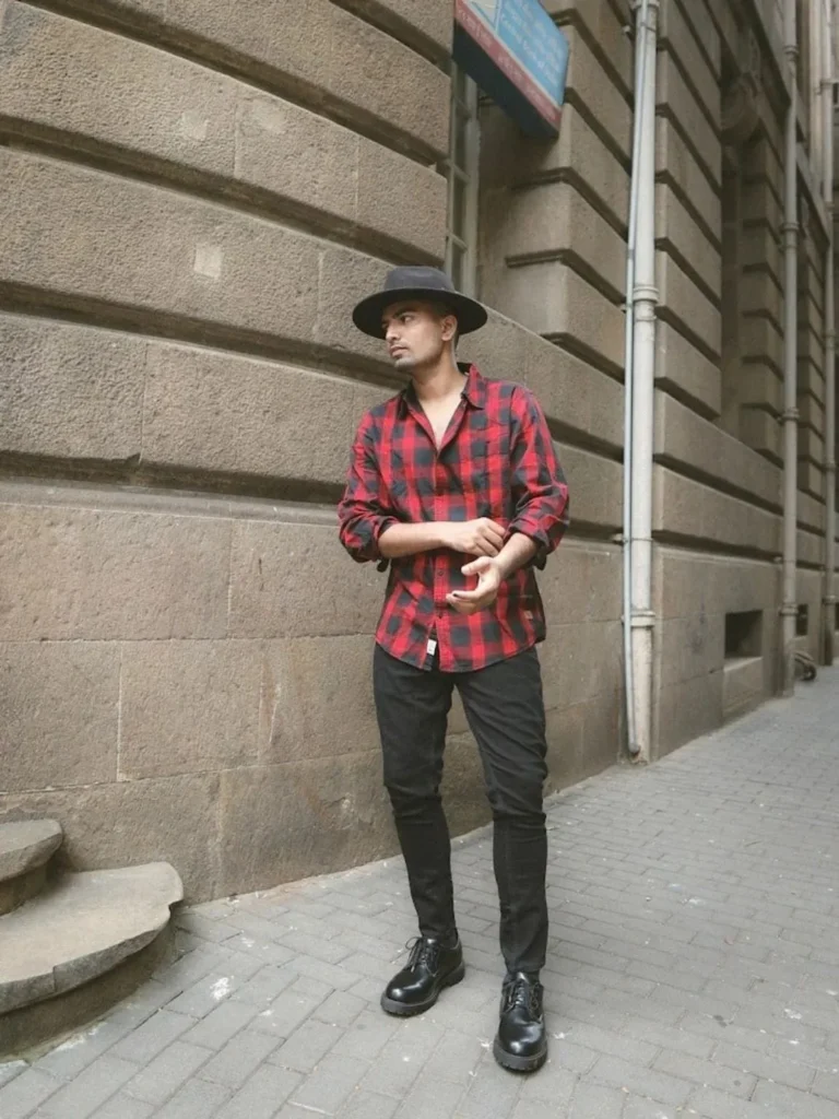 red check shirt and black jeans combination